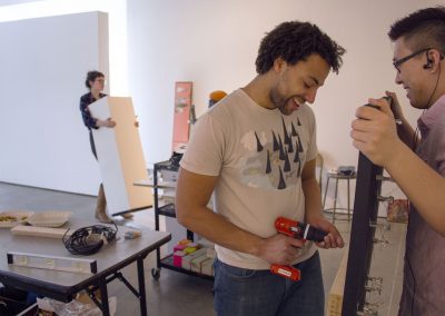 Students prep for an exhibition at Gallery 7, University of Wisconsin-Madison.