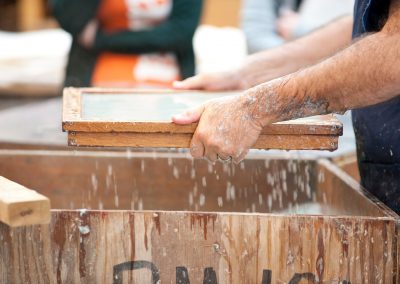 Jim Escalante, professor of art, demonstrates a paper making process during his Art 446 Artists' Books class in the paper lab inside the Art Lofts building at the University of Wisconsin-Madison.