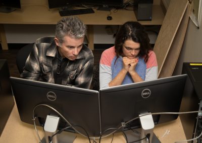 Digital Media Faculty Stephen Hilyard assists a student on their digital media project at the Mosse Humanities Building at the University of Wisconsin-Madison.