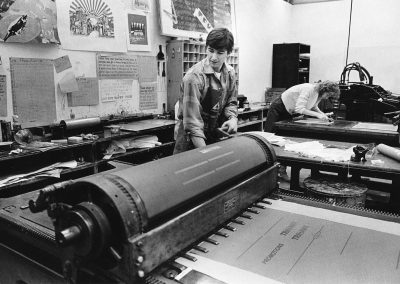 An art student works on a printmaking project in the printmaking lab at the University of Wisconsin-Madison.