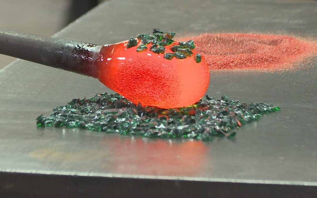 Interactive glass laboratory helps people create ornaments for upcoming holidays by Emilie Burditt